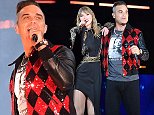 Taylor Swift surprises fans with special guest Robbie Williams at Wembley