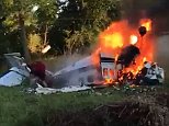 Detroit plane crash survivor filmed rolling out of burning wreckage