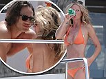 Gwyneth Paltrow showcases her enviable bikini body as she cosies up to fiancé Brad Falchuk in Italy