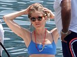 Sienna Miller flaunts her slender pins in eye-catching blue bikini during idyllic Italian getaway