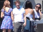 Leonardo DiCaprio and Sean Penn flirt with the ladies as they host their July 4th bash in Malibu