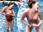 Miley Cyrus shakes her stuff as she plays in the pool in her bikini