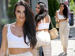 Love Island's Rosie Williams flashes her midriff in a white crop top