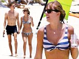 Taylor Swift and Joe Alwyn enjoy drinks on the beach during romantic vacation in Turks And Caicos