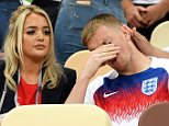 England v Croatia: Players' partners look downcast from the stands