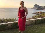 Amy Schumer hints she's pregnant as she shows off bump in red dress and says 'cookin somethin Up'