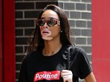 Winnie Harlow flaunts her tiny midriff and long legs in a trendy ensemble as she heads out in NYC