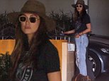 Delta Goodrem keeps a low-profile in a grey fedora and designer shades in Los Angeles