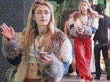 Paris Jackson bares taut midriff in crop top and faux fur coat as she smokes outside Hollywood bar