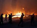 Greece fires: At least 60 dead including 26 in one seaside villa