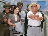 Kim Jong-un and his wife inspect a North Korean fish pickling factory