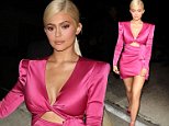 Kylie Jenner wows in thigh-skimming magenta dress and blonde tresses as she arrives to her bash