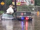 New Jersey wedding party is rescued from their car after it was stranded in high floodwaters