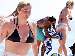 Kesha's boyfriend Brad Ashenfelter dries off her booty in Mexico