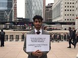 Refugee who earned rocket science degree from UCL stood in Canary Wharf with sign asking for job