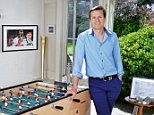 Roger Black, 52, in the conservatory of his Surrey home