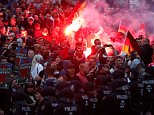 Thousands of far-right protesters clash with police in Germany after man was 'killed by migrants'