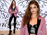 Victoria's Secret Angel Taylor Hill stuns in black leather bustier and skintight trousers in NYC