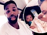 Khloe Kardashian shares new photo of baby True on a private jet as beau Tristan Thompson looks on