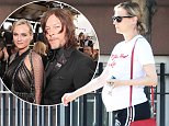 Diane Kruger covers her bump in 'all you need is love' shirt on Labor Day