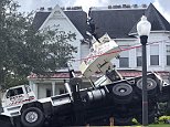Florida home split in two by a crane