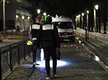 Knifeman is arrested after injuring seven people in rampage through central Paris